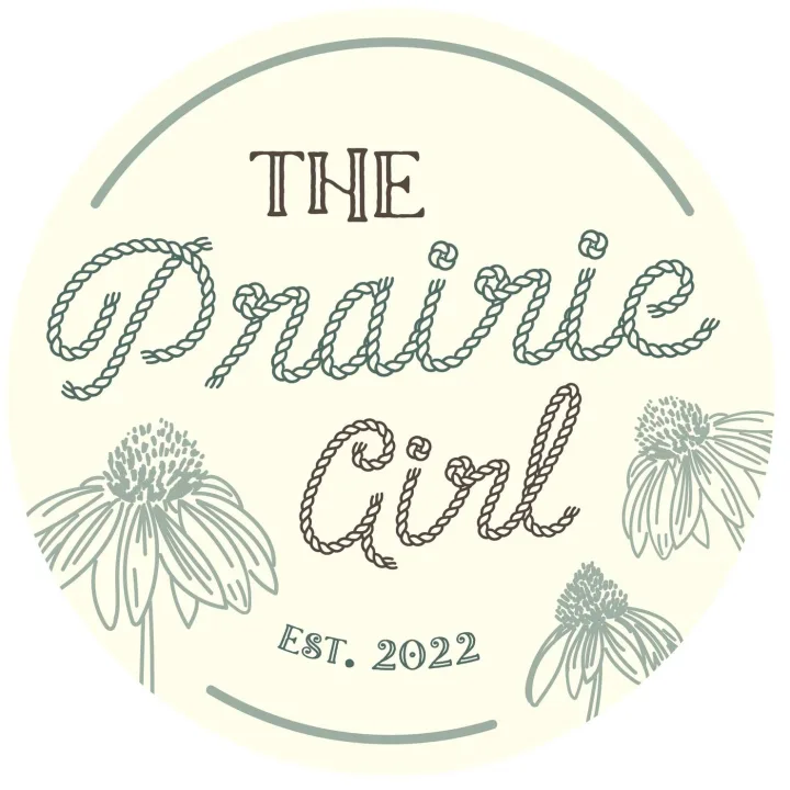 The Prairie Girl logo: rope lettering with coneflowers, established 2022